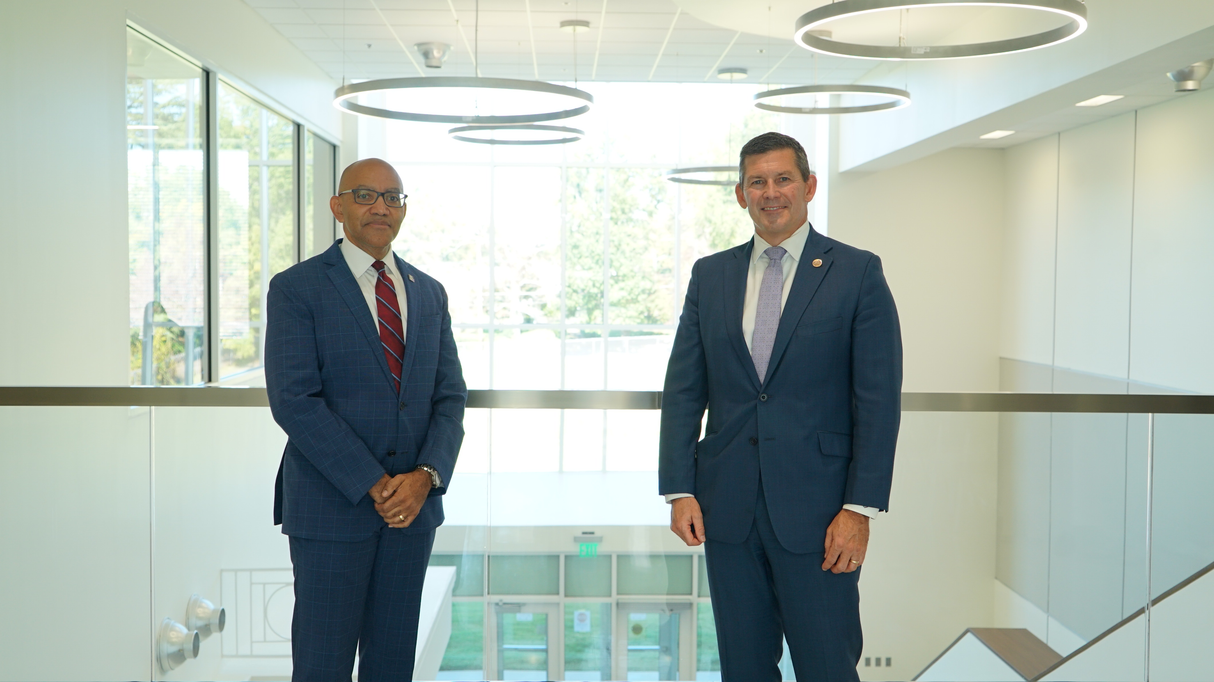 NCCCS President Thomas Stith and Mitchell President Dr. Tim Brewer in Mitchell's Health Sciences Building.