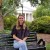 Genny Wooten sits in front of Main Building on Mitchell's historic Statesville Campus